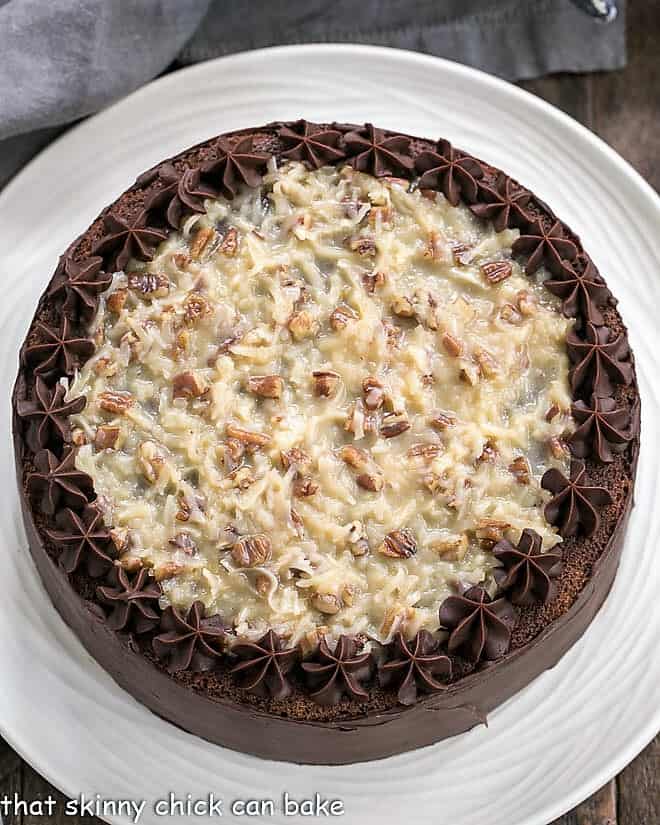 Homemade German Chocolate Cake Recipe - 4 layers of chocolate cake filled with a caramel coconut pecan filling, then iced with a rich, chocolate frosting! Perfect cake for any celebration! Overhead view of Classic German Chocolate Cake.
