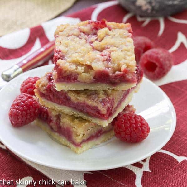 Raspberry Bars on a white plate.
