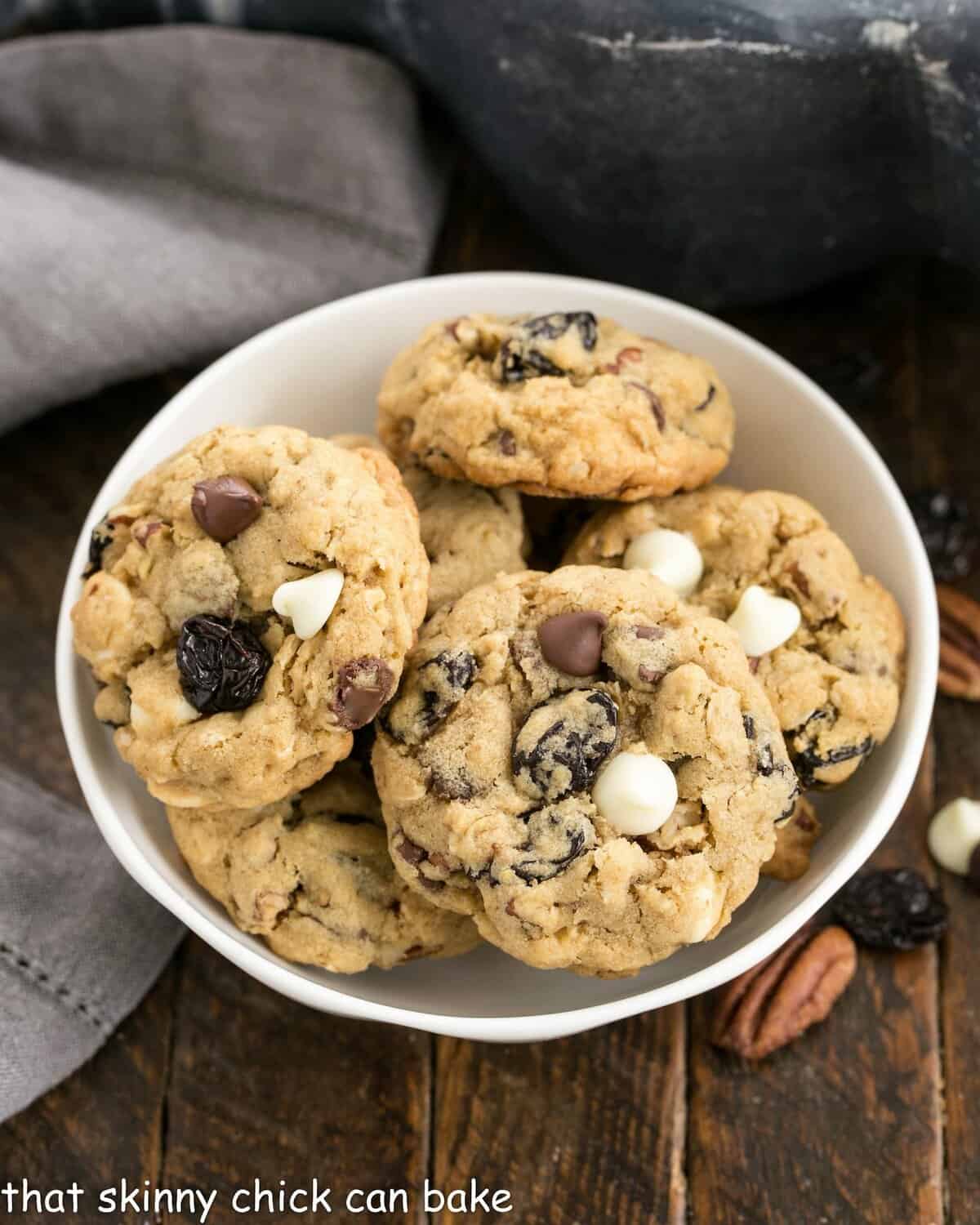 Overhead view of a bowl of oatmeal cherry chocolate chip cookies.