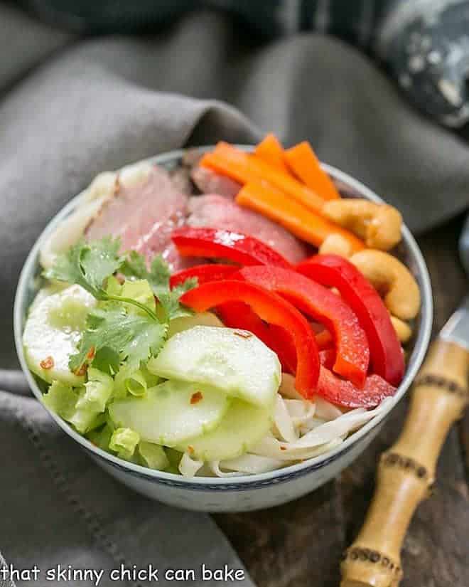 Vietnamese Beef Noodle Bowl with a bamboo fork