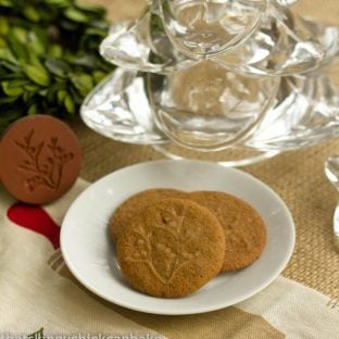 3 ginger cookies on a small white plate