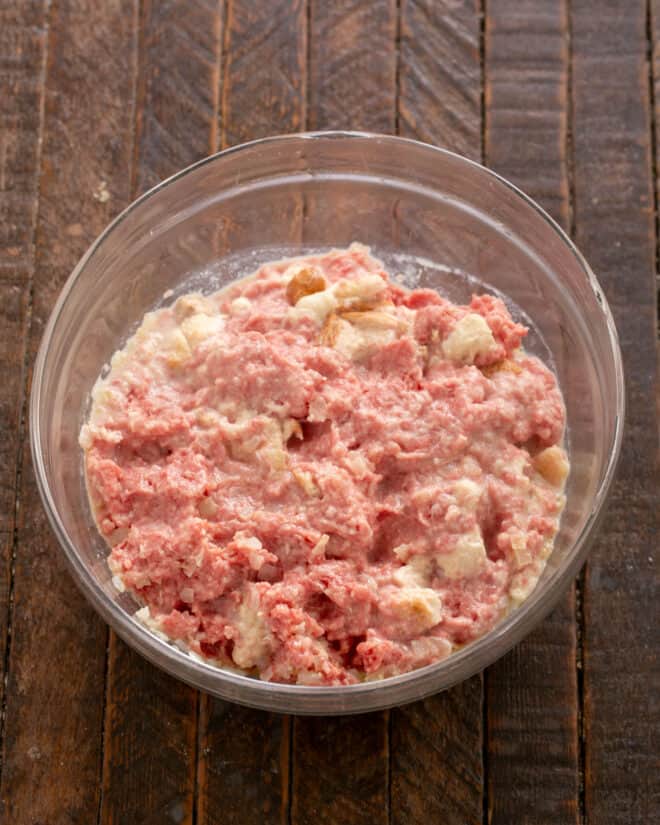 Bread, milk and aromatics mixed into meat.