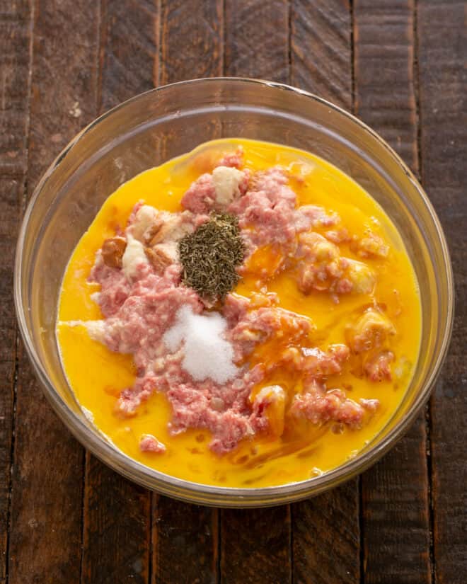 Eggs and seasonings added to meat mixture.