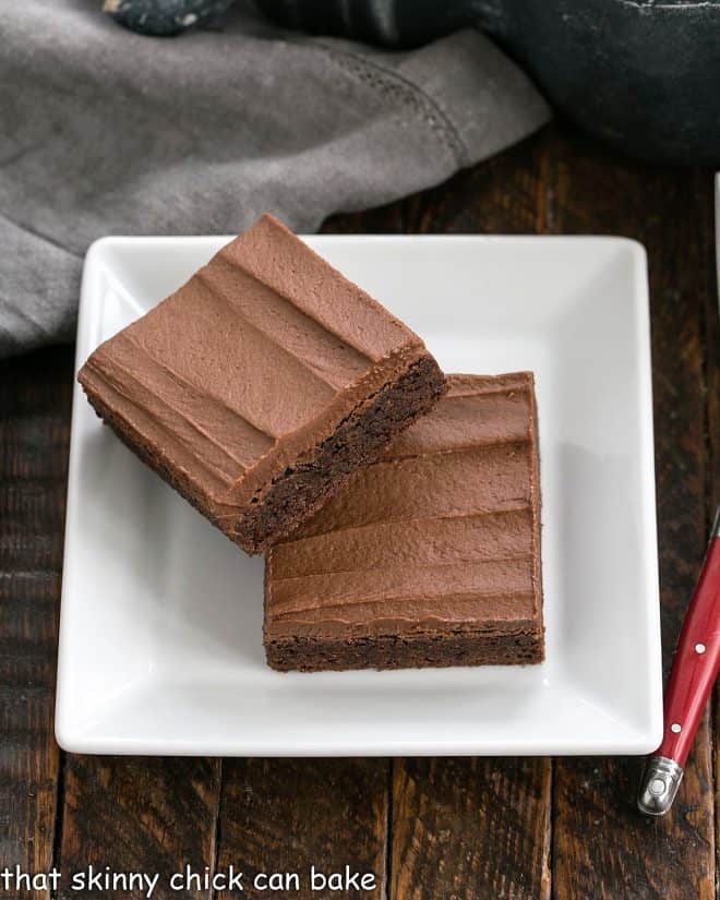 2 Cocoa Brownies on a square white plate