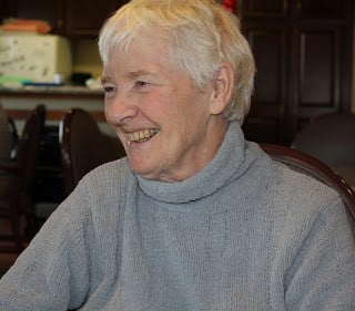 My mom laughing.