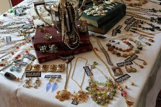 Table full of handmade jewelry