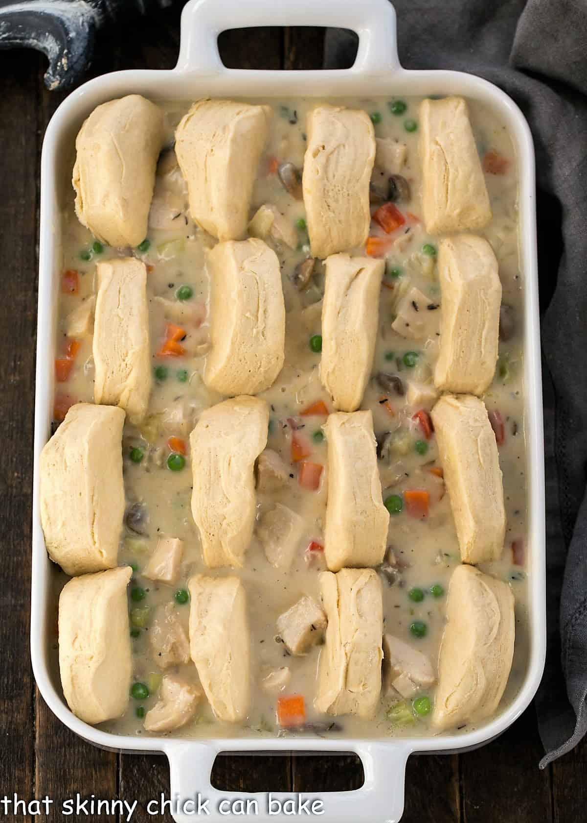 How to arrange cut biscuits on the pot pie.