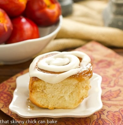 Nectarine Cinnamon Rolls on a white plate.