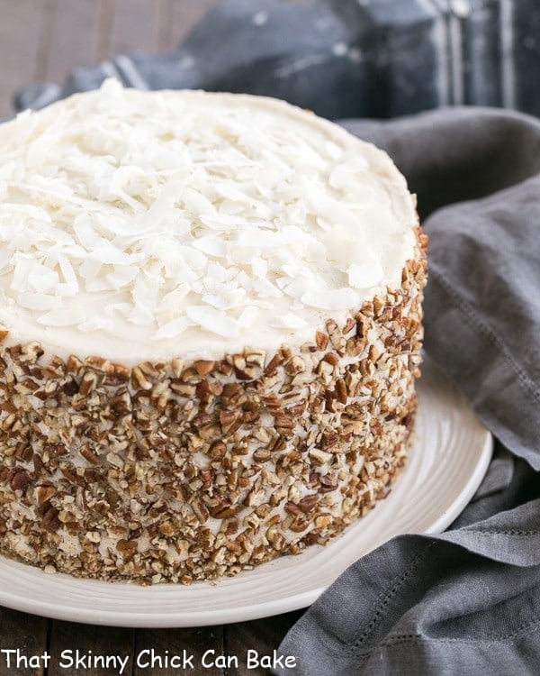 Caramel Filled Carrot Cake on a white serving plate.