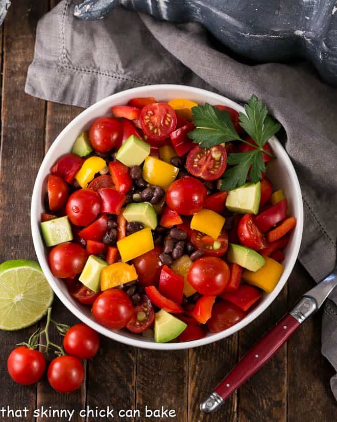 Overhead view of Guacamole Salad or Avocado Salad in a white serving bowl.