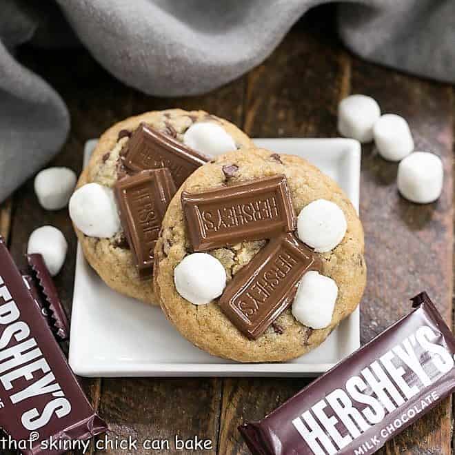 Two S'mookies AKA Gooey S'mores Cookies on a small white plate featured image,