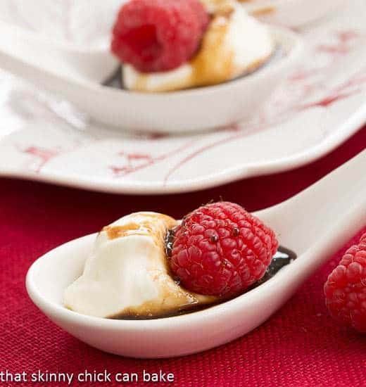 Balsamic Raspberries with Mascarpone Cream - an easy, elegant, bite sized dessert recipe Balsamic Raspberries with Mascarpone Cream in white soup spoons