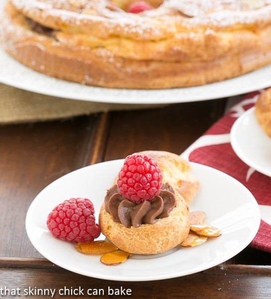 Paris-Brest Cake - a cream puff made from leftover batter filled with chocolate pastry cream and topped with a raspberry