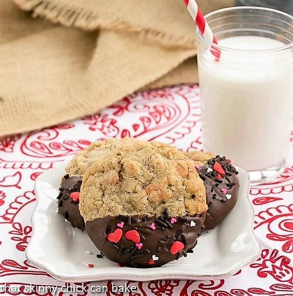 Big Dipper Oatmeal Butterscotch Cookies on a square white plate with a glass of milk.