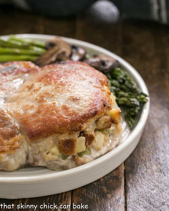 Close view of Stuffed Pork Chops with Apple Thyme Sauce. 
