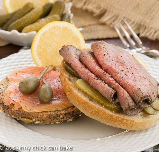 Two open faced tartine sandwiches on a plate
