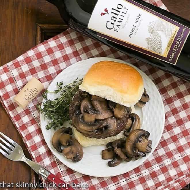 Overhead view Mushroom Topped Pinot Noir Burgers. 
