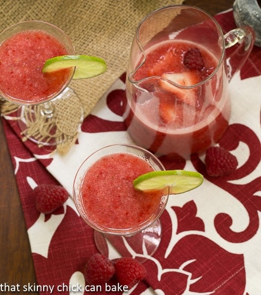 Overhead view Frozen Fresh Berry Daiquiris in glasses and in a pitcher