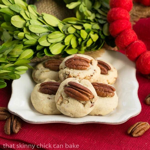 Pecan Sandies on a square white dessert plate.