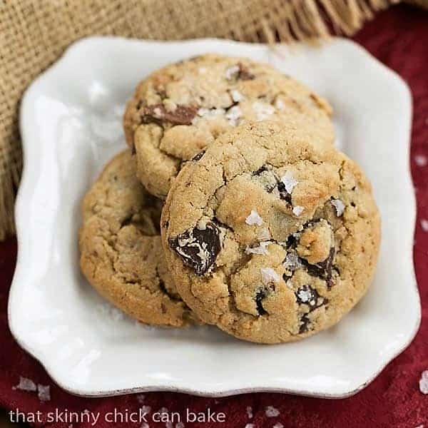 Salted Toffee Chocolate Chunk Cookies on a square white plate