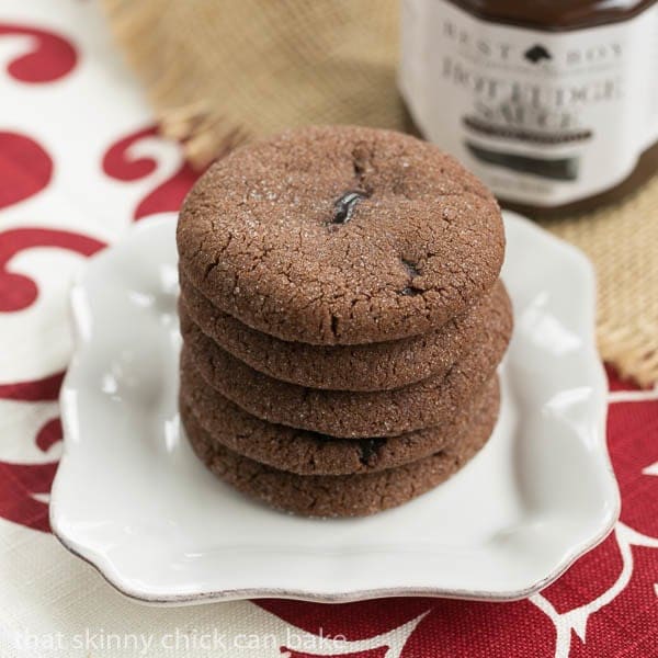 A stack of Chocolate Lava Cookies  on a square white plate.