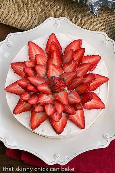 Overhead view of Strawberry Vanilla Cream Pie topped with fresh strawberry slices.