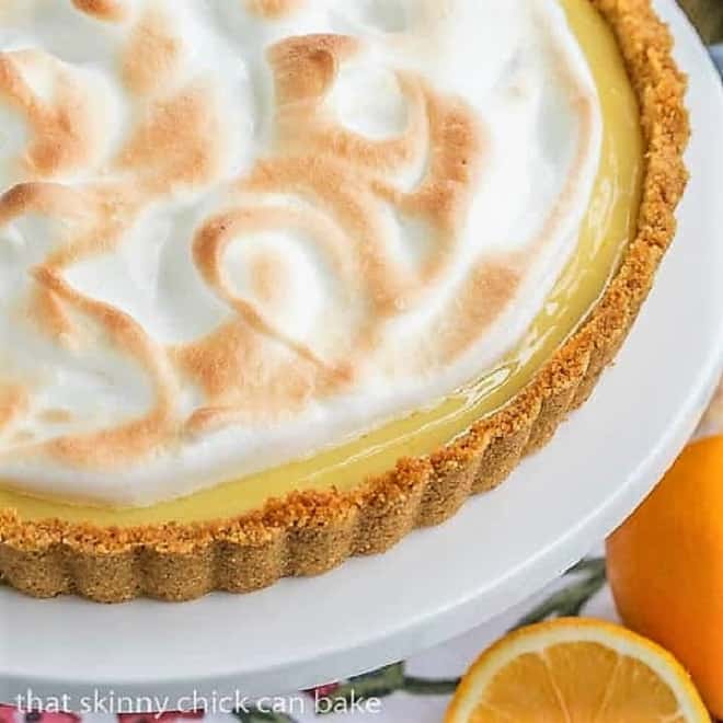 Close view of Meyer Lemon Tart with Meringue Topping on a cake stand.
