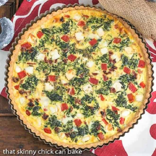 Sun-dried Tomato and Spinach Quiche - A memorable Mediterranean Quiche Sun-dried Tomato and Spinach Quiche overhead view.