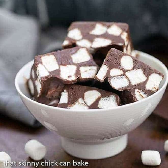 Chocolate Marshmallow Fudge - Only 3 ingredients and a few minutes to have a batch of super rich, delicious fudge! Chocolate Marshmallow Fudge in a white ceramic bowl.