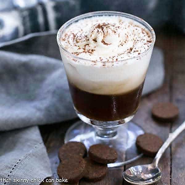 Vanilla Bean Iced Coffee in a glass coffee mug.