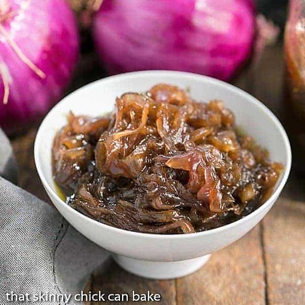 French Onion Marmalade - A French inspired condiment also known as Confit d"oignon!! French Onion Marmalade in a white bowl with red onions.