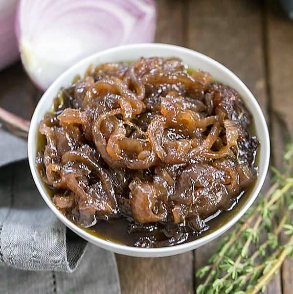 Onion Marmalade - A French inspired condiment!! Perfect way to elevate a grilled burger! Onion Marmalade in a white ceramic bowl.