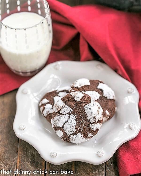 Chocolate Crackle Cookies on decorative white plate.
