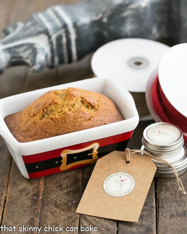 Mini Pumpkin Breads - Perfect for gifting throughout the holiday season! Mini Pumpkin Breads with gift wrapping supplies.