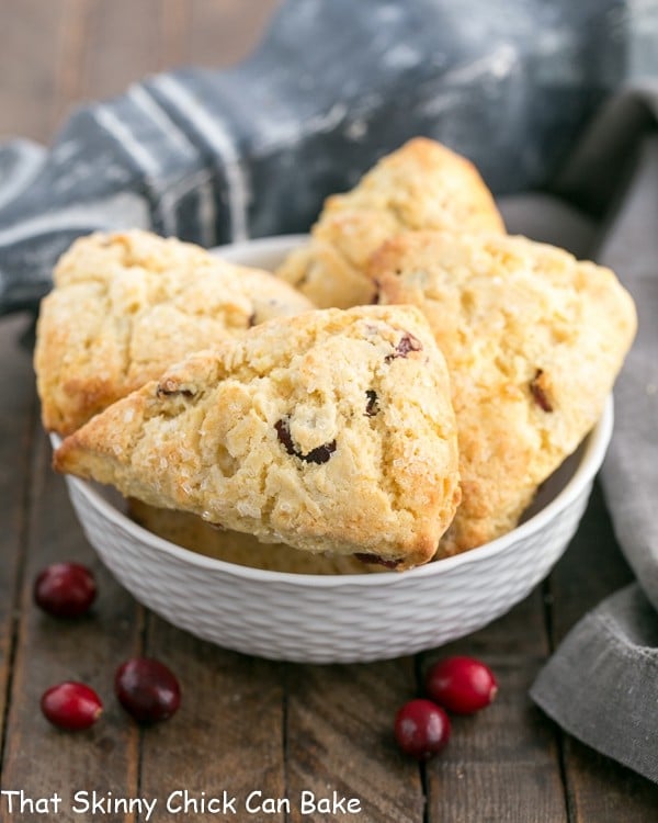 Cranberry Eggnog Scones in a white ceramic bowl.