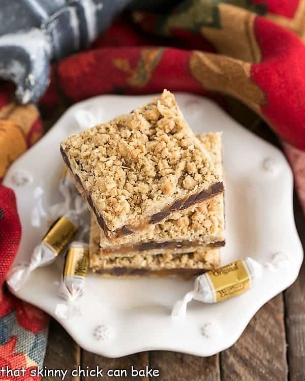 Overhead image of Oatmeal Caramel Bars stacked onto a dessert plate.