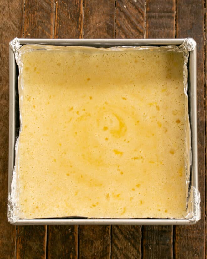 Lemon bars topped with custard.