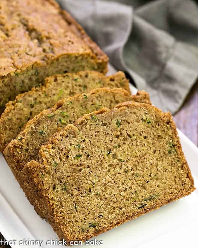 Process shot #5 of baked and sliced zucchini bread.