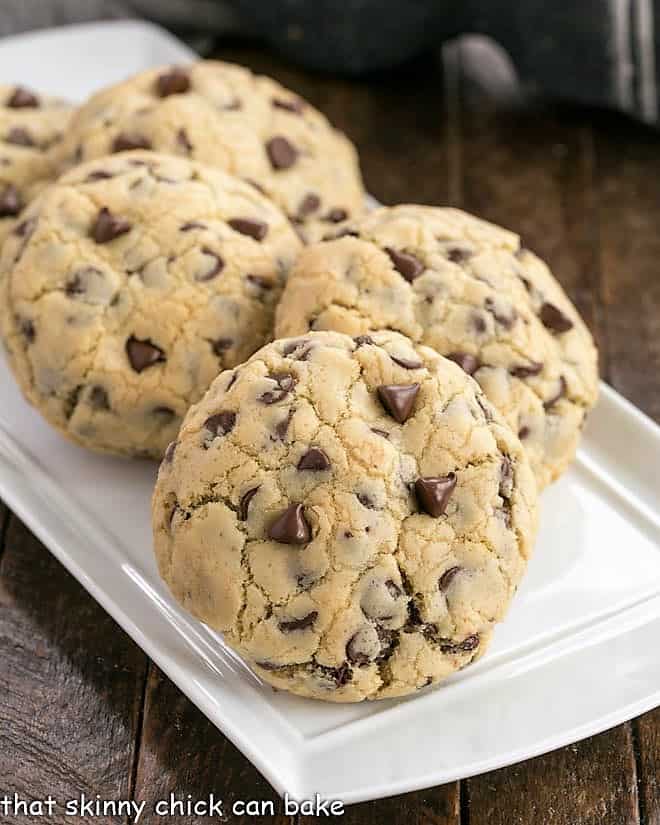 Levain Cookie Recipe - Huge chocolate chip cookies like the famous Levain Bakery cookies! Levain Bakery Chocolate Chip Cookies on a whiite ceramic tray.