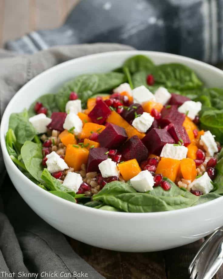 Roasted Fall Vegetable Salad | Roasted beets and butternut squash pair with farro, spinach and goat cheese for a delightful autumnal salad