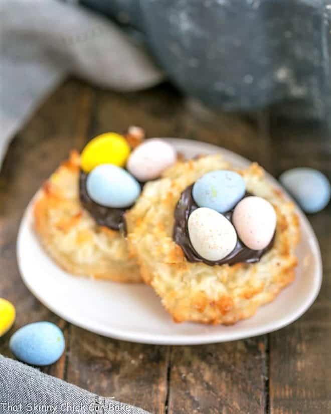 Two Coconut Macaroon Easter Nests on a small oval dish.