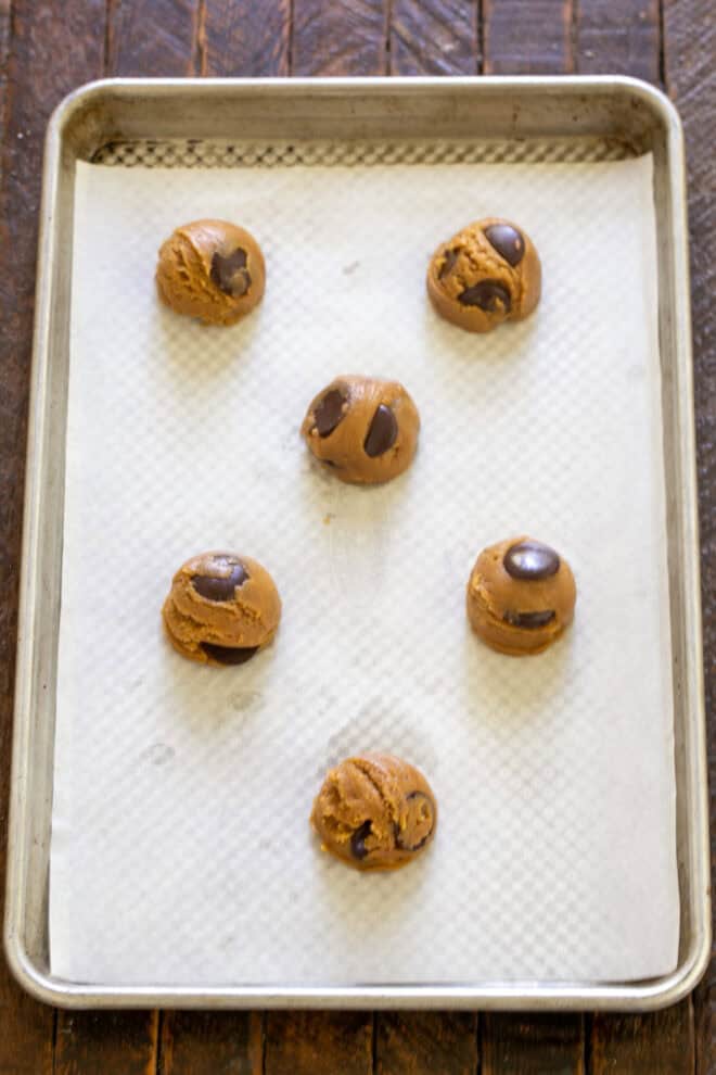 Dough balls on baking sheet.