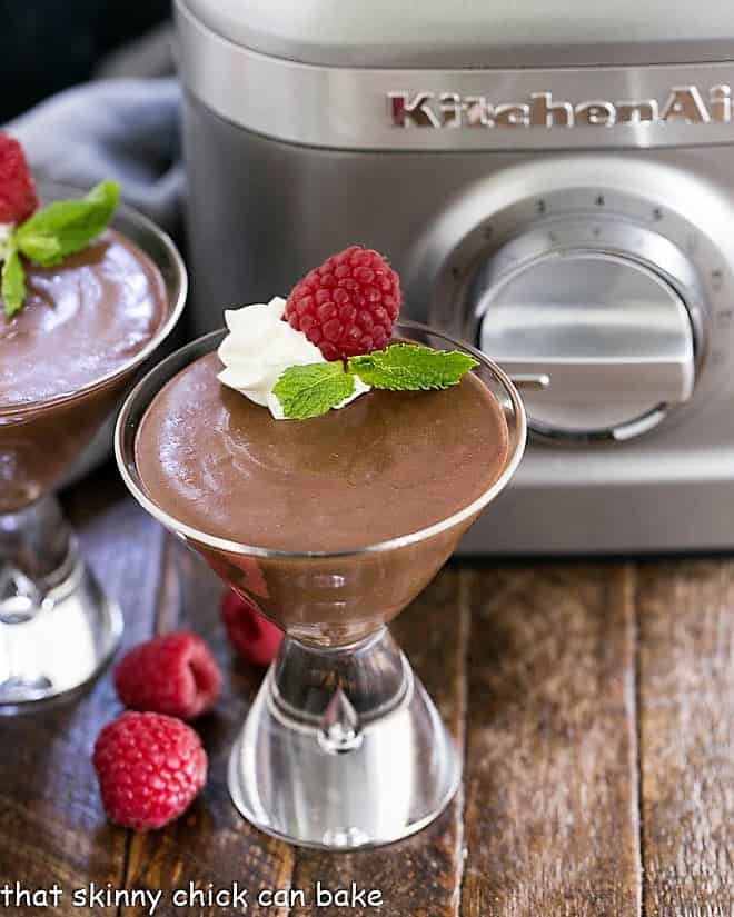 Blender Chocolate Mousse - The easiest chocolate mousse ever!!! Blender Chocolate Mousse in a martini glass with whipped cream and raspberries.