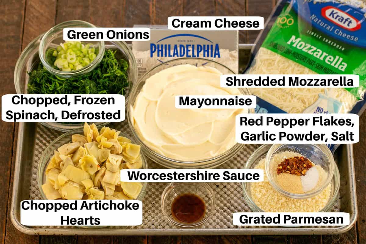 Spinach Artichoke Dip Ingredients on a sheet pan with labels.