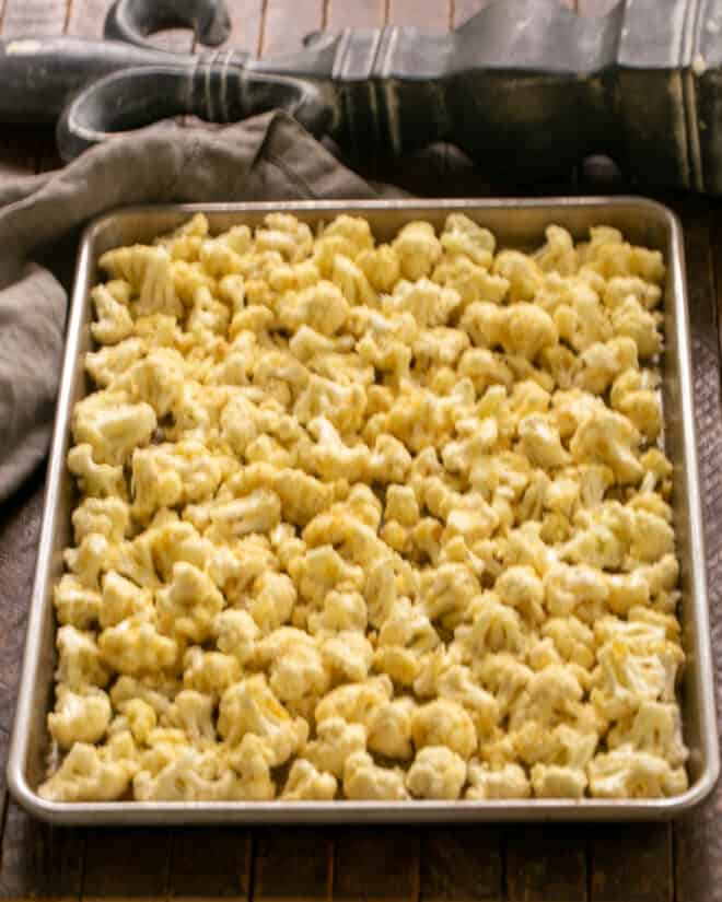 Cauliflower spread on sheet pan.