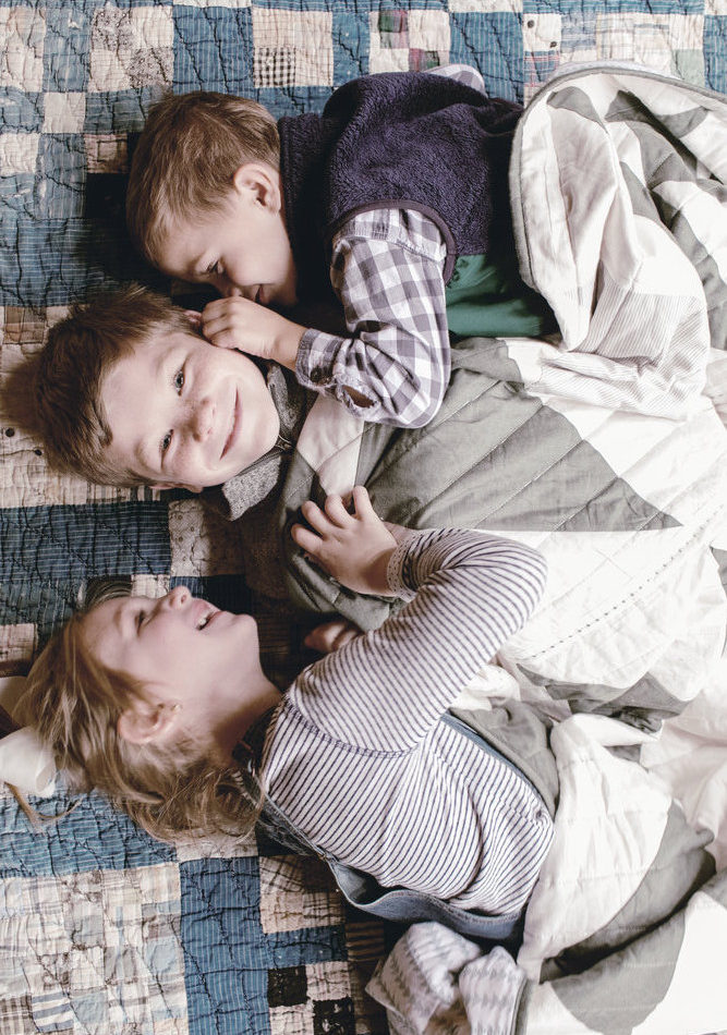 Family photography on quilt