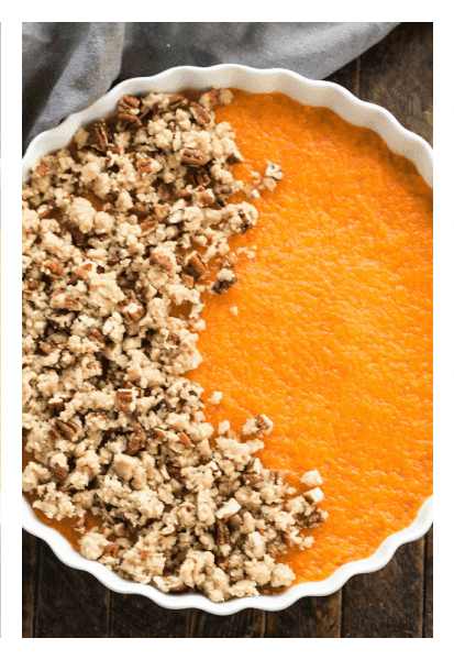 Sweet Potato Casserole with part of topping added.