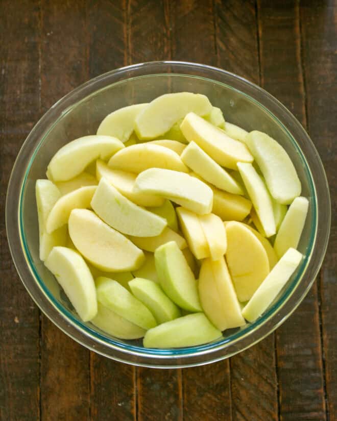 Apples sliced for apple crisp.