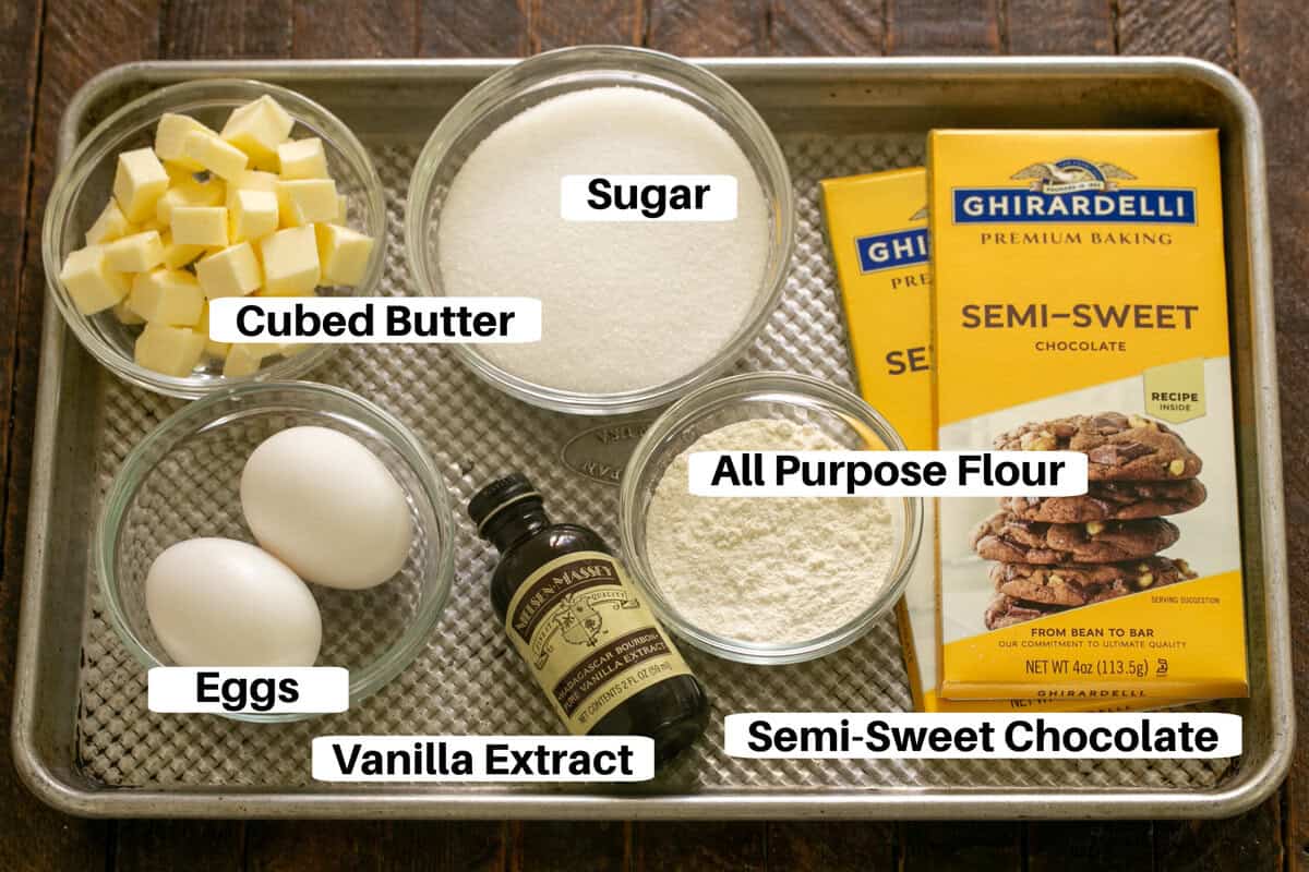 Fudgy brownies ingredients with labels on a sheet pan.