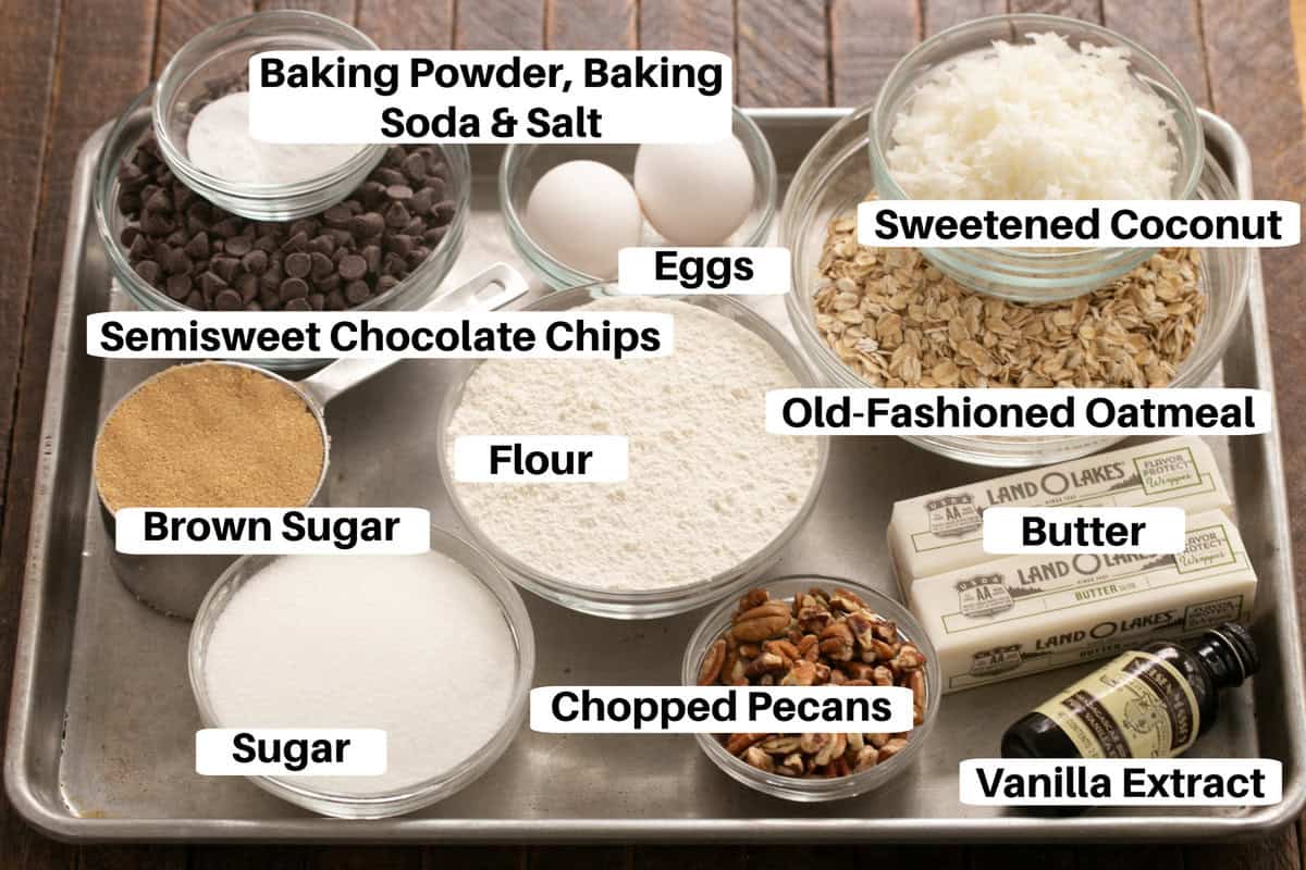 Cowboy Cookies Ingredients with labels on a metal sheetpan.